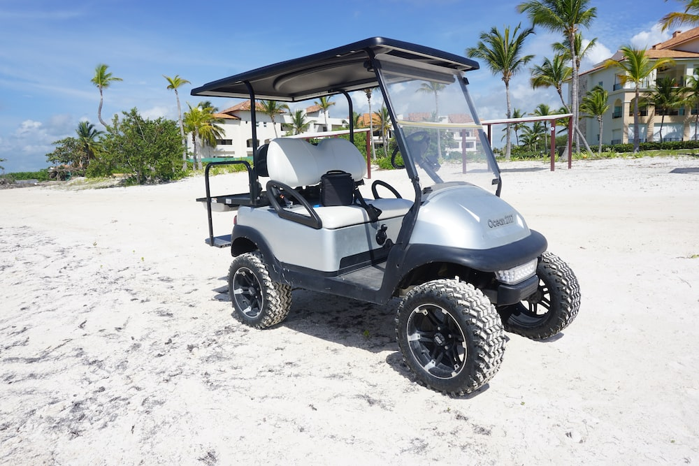 Gray golf cart at the beach